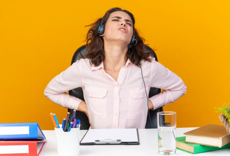 rugpijn door lang zitten